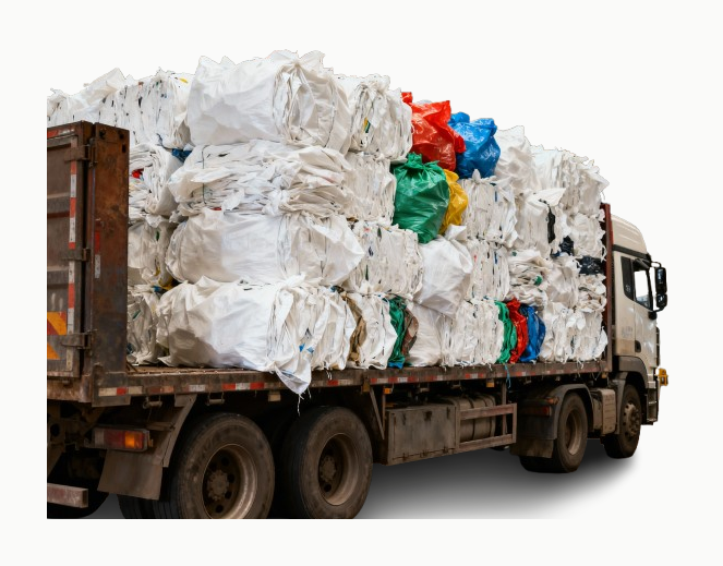 Truck delivering baled polypropylene waste for recycling